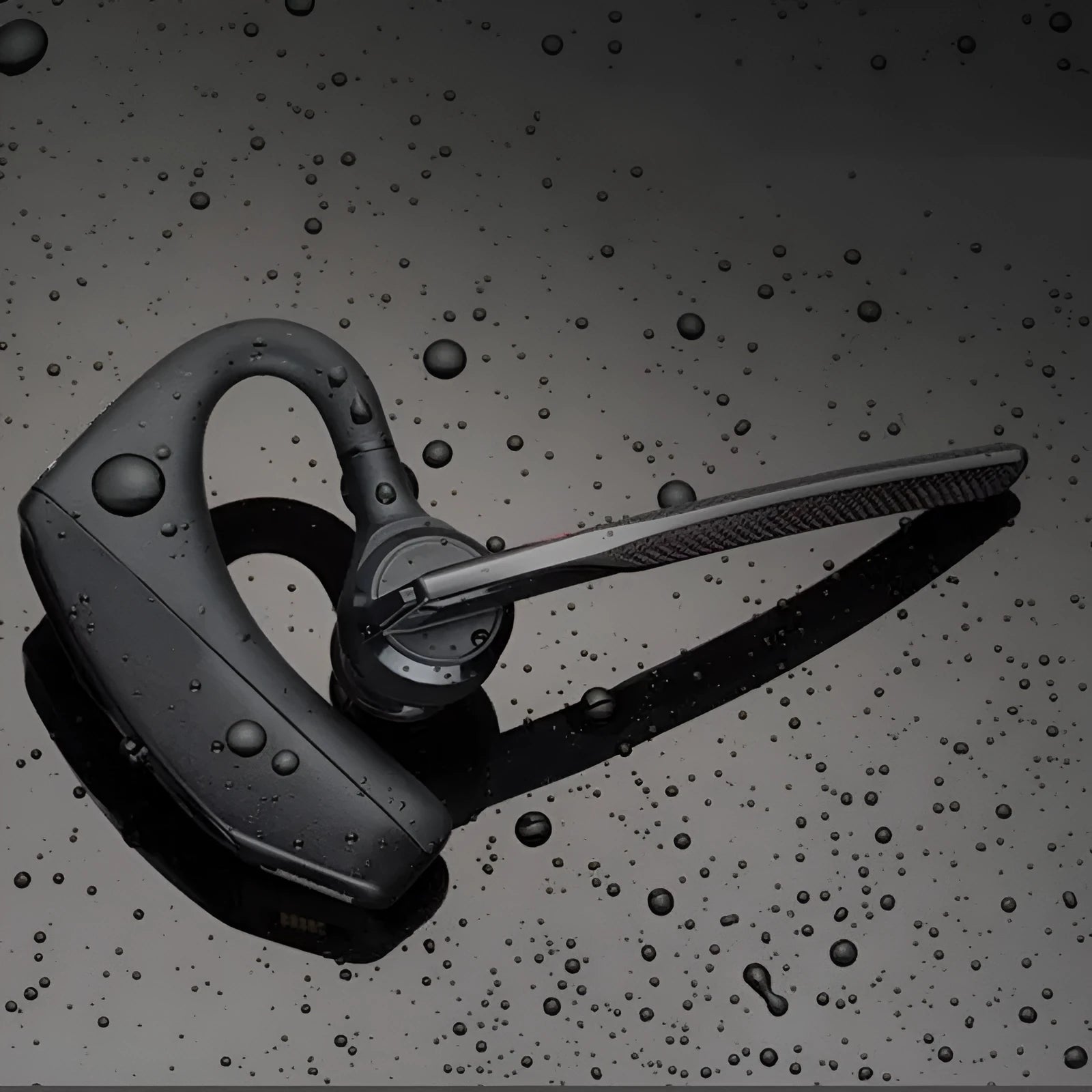 Black plastic Bluetooth sports headphones with a large battery and USB port.