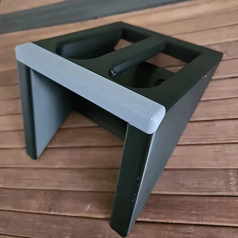 Black plastic punk-style pistol stand for model gun display measuring 10.85cm by 7.6cm