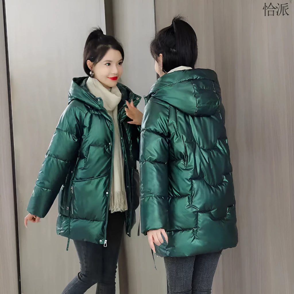 Women's loose thick hooded winter jacket in acrylic fabric on a hanger