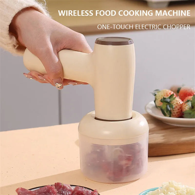 Beige yellow USB rechargeable electric garlic chopper with 250ml cup and 304 blade on a kitchen counter