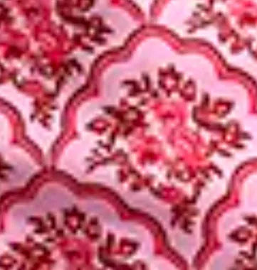 Printed pink split bikini set with exposed back and adjustable shoulder straps on woman
