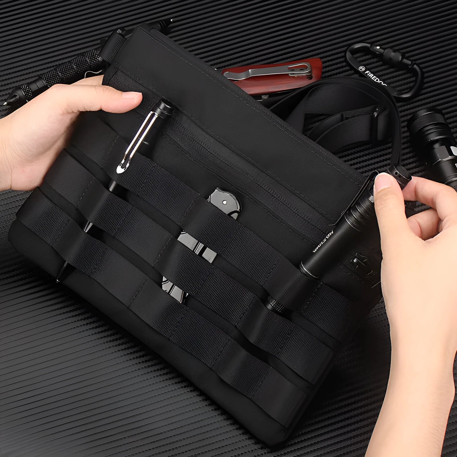 Black Oxford cloth portable military kit pouch with dimensions 18cm by 3.5cm