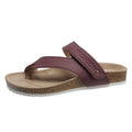 A pair of solid-colour flip-flops with a flat toe ring and thick foam sole.