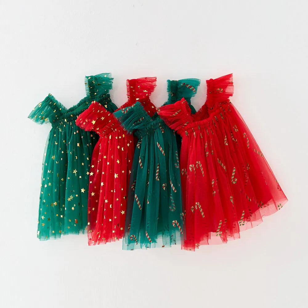 XINGX girls suspender skirt in Snowflake Red and Green colour, polyester fabric, side view
