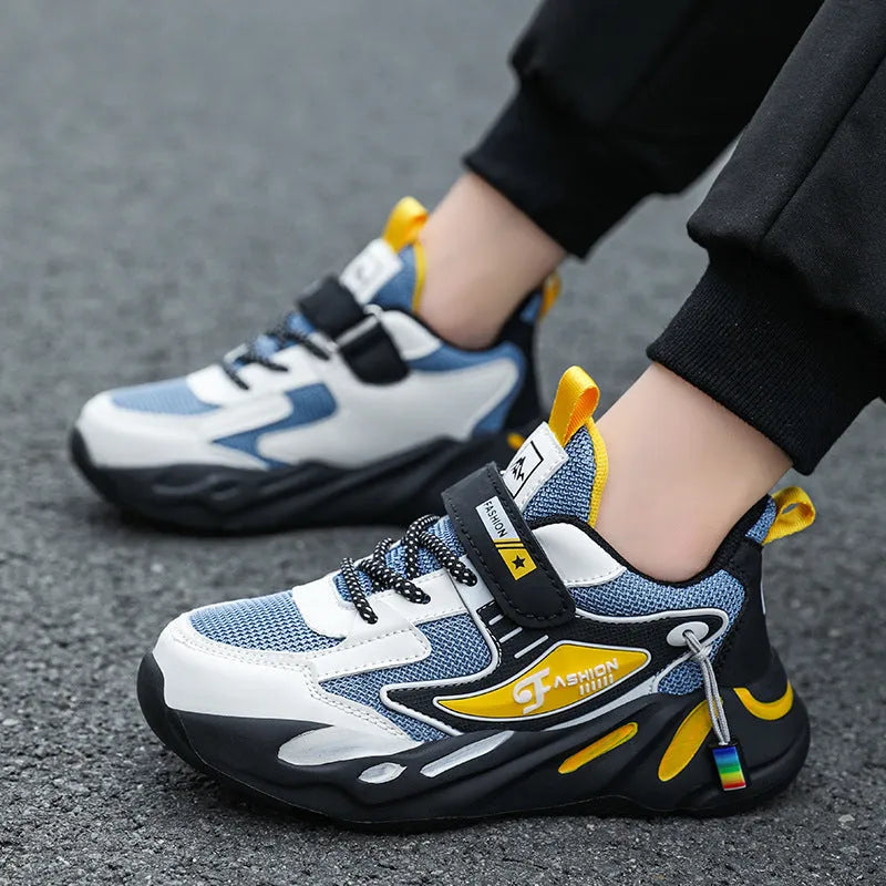 Boys' dark blue and light blue sports running shoes with Velcro strap and mesh upper.