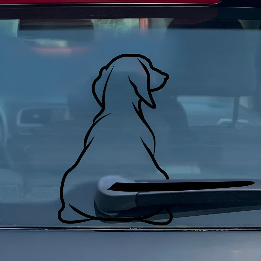 Cartoon wiper back dog car sticker shown on vehicle window with waving tail design