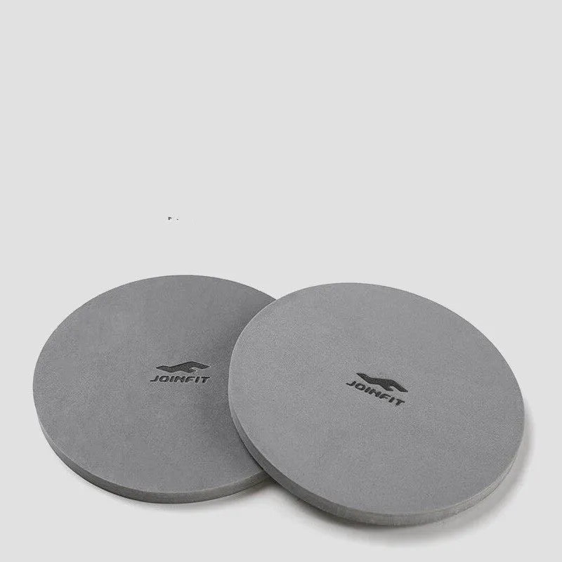Shadow grey abdominal exercise wheel with stainless steel and TPR construction on a kneeling mat