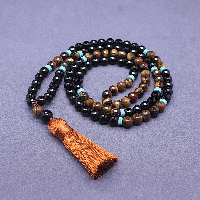 Geometric agate jewellery set with black bracelet and tiger's eye stone necklace