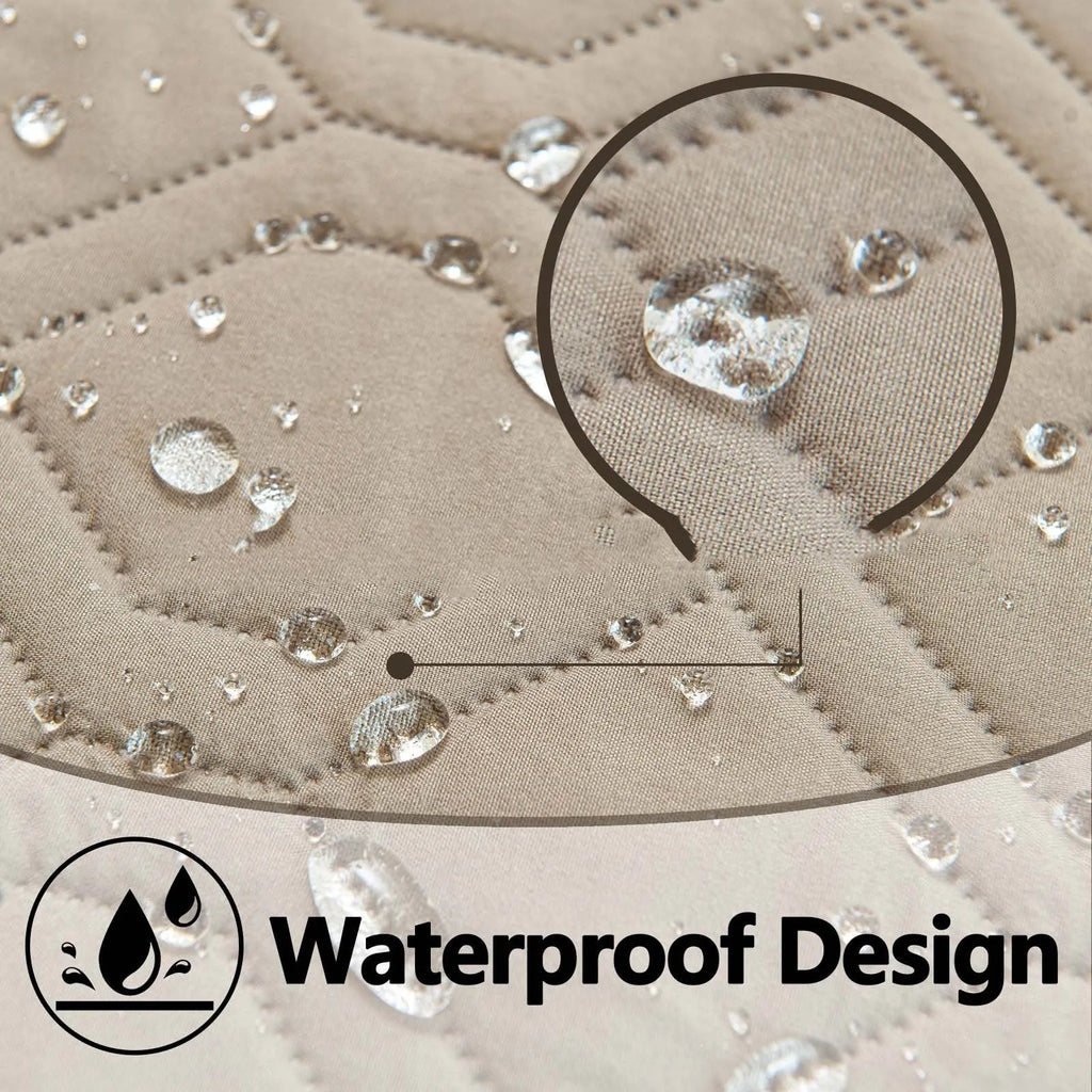 Reversible waterproof dog cushion on a sofa in dark grey and light grey contrast colours.