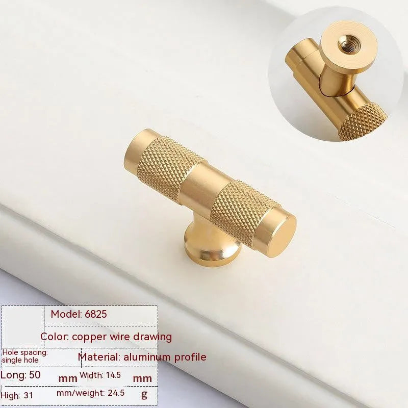 Brushed brass aluminium furniture handle for cabinet doors and drawers.