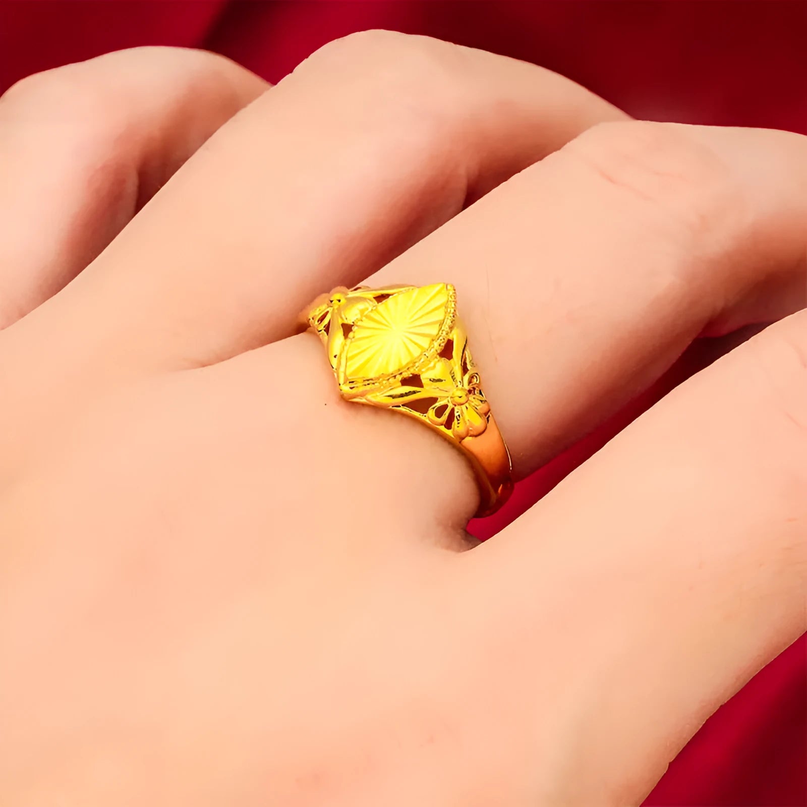 Gold open diamond flower ring with geometric floral pattern and textured brass construction