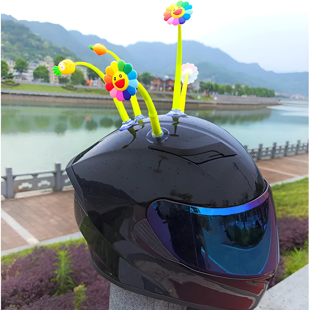 Silicone sunflower helmet decoration with suction cup attachment showing flexible stalk and petals