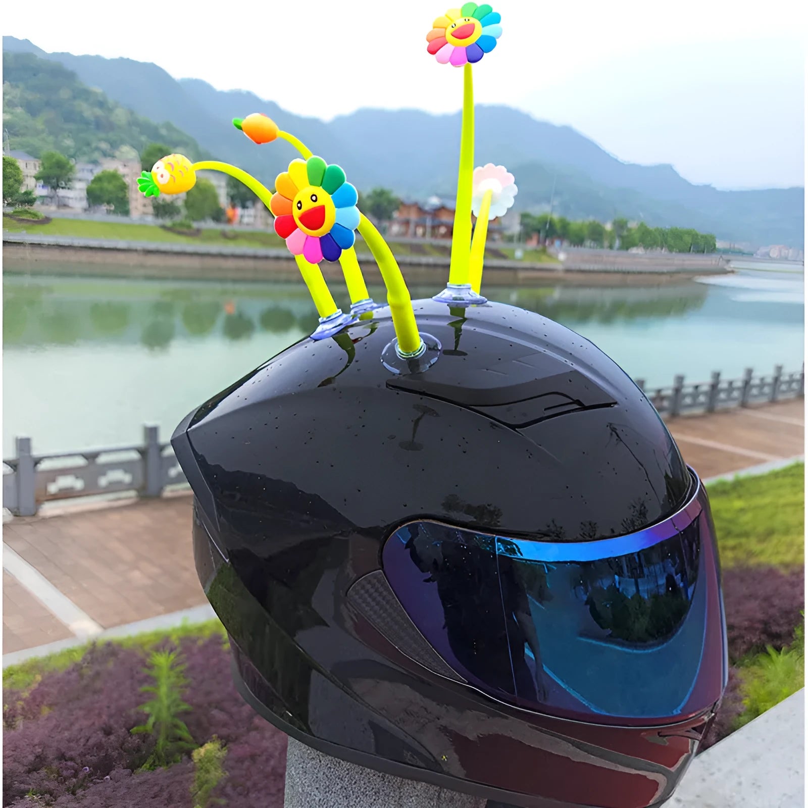 Silicone sunflower helmet decoration with suction cup attachment showing flexible stalk and petals