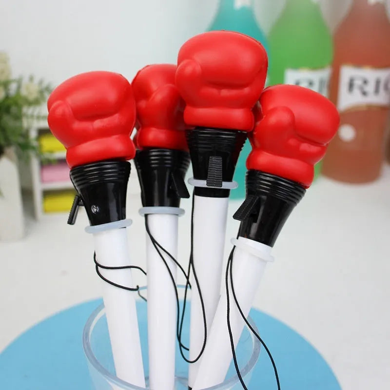 Four pressure relief boxing press ejection pens with 0.7mm bullet tips and black ink refills