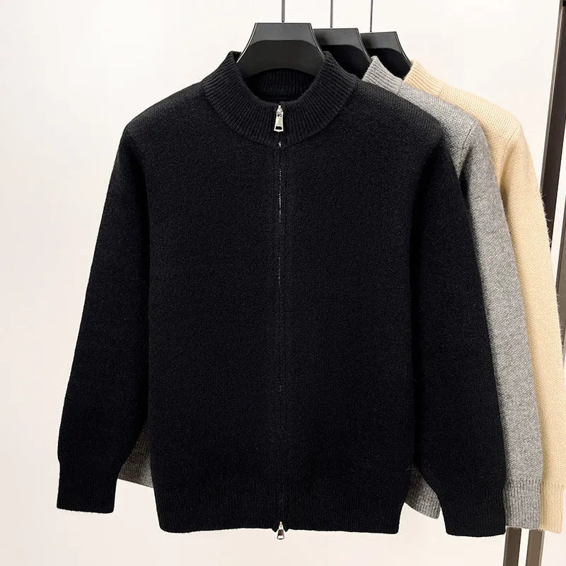 Men's black stand collar zipper cardigan in a loose, thickened knit on a hanger.