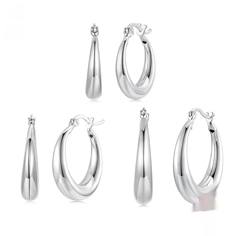 Geometric ring design ear clip earrings in copper alloy with silver needle fastening
