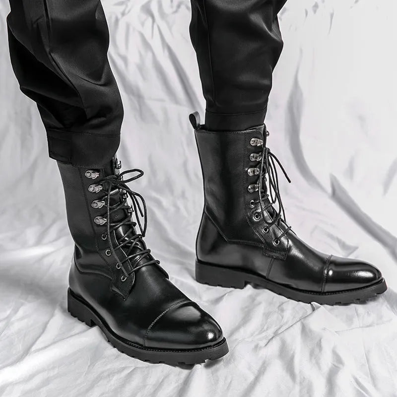 Black denim lace-up booties with lace closure and low heel on a white background