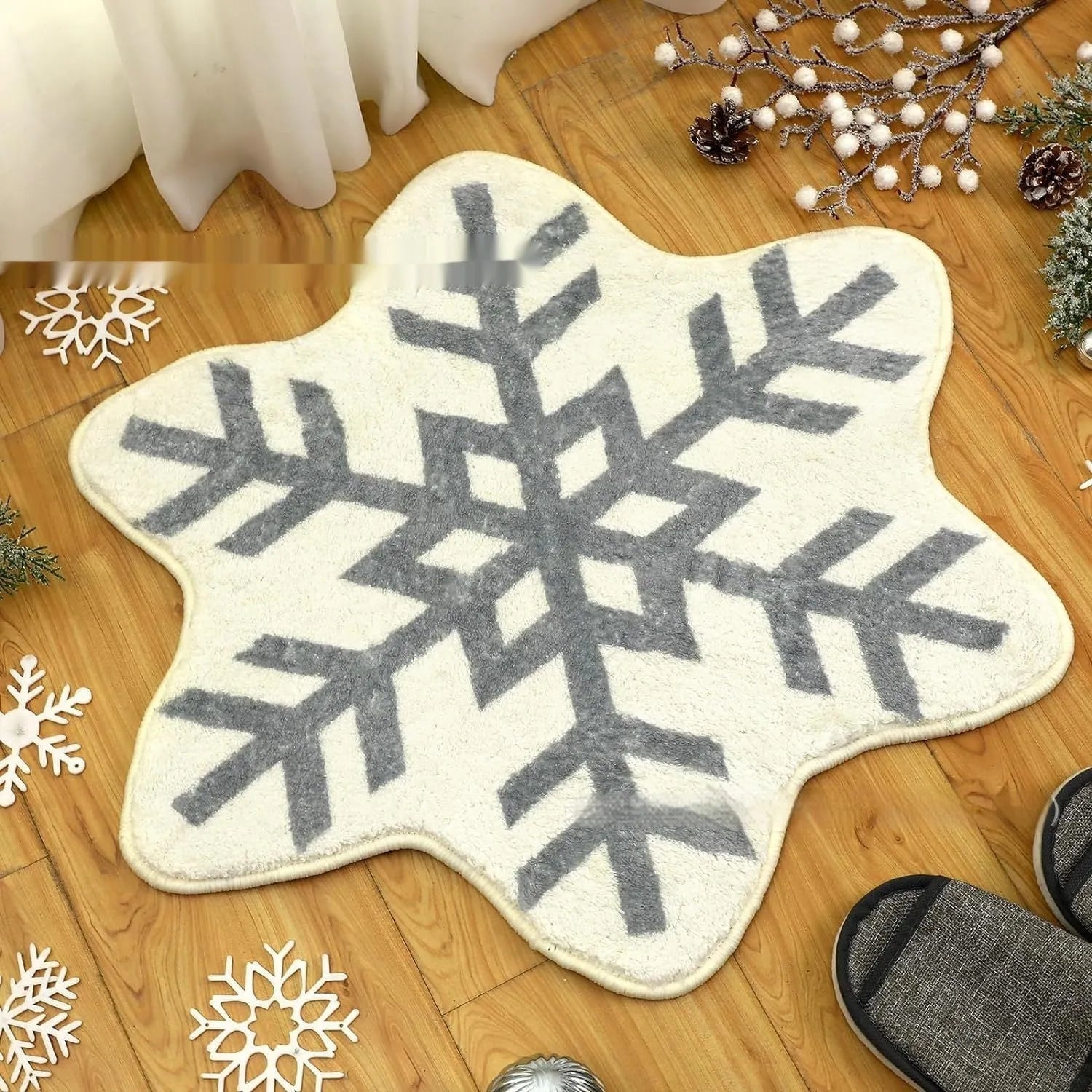 Round red and green Christmas pattern carpet on a wooden floor.