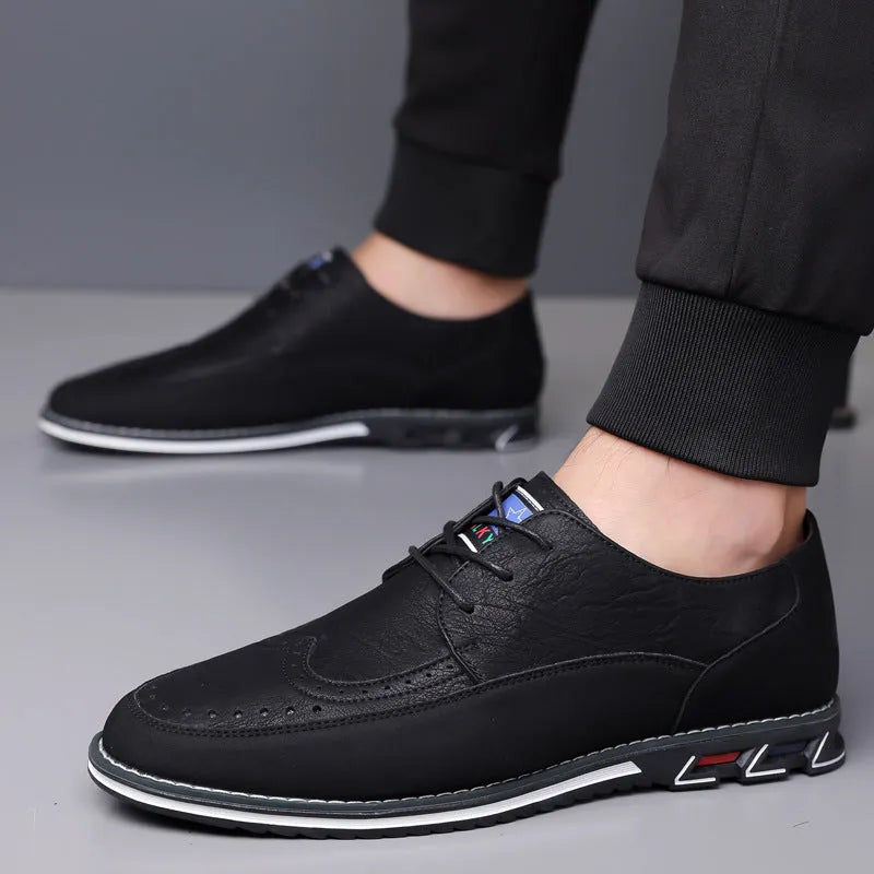 Men's low-top casual leather shoes with a fabric upper, leather toe cap, and rubber sole in orange colour.