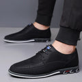 Men's low-top casual leather shoes with a fabric upper, leather toe cap, and rubber sole in orange colour.