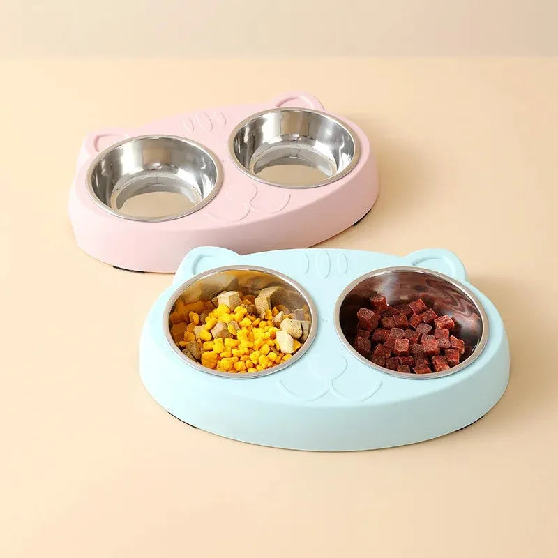 Blue macaron-shaped plastic pet feeder tray with two bowls for food and water