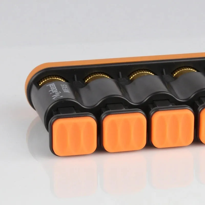 Grey and orange silicone finger trainer for hand strength development in piano, guitar, guzheng practice.