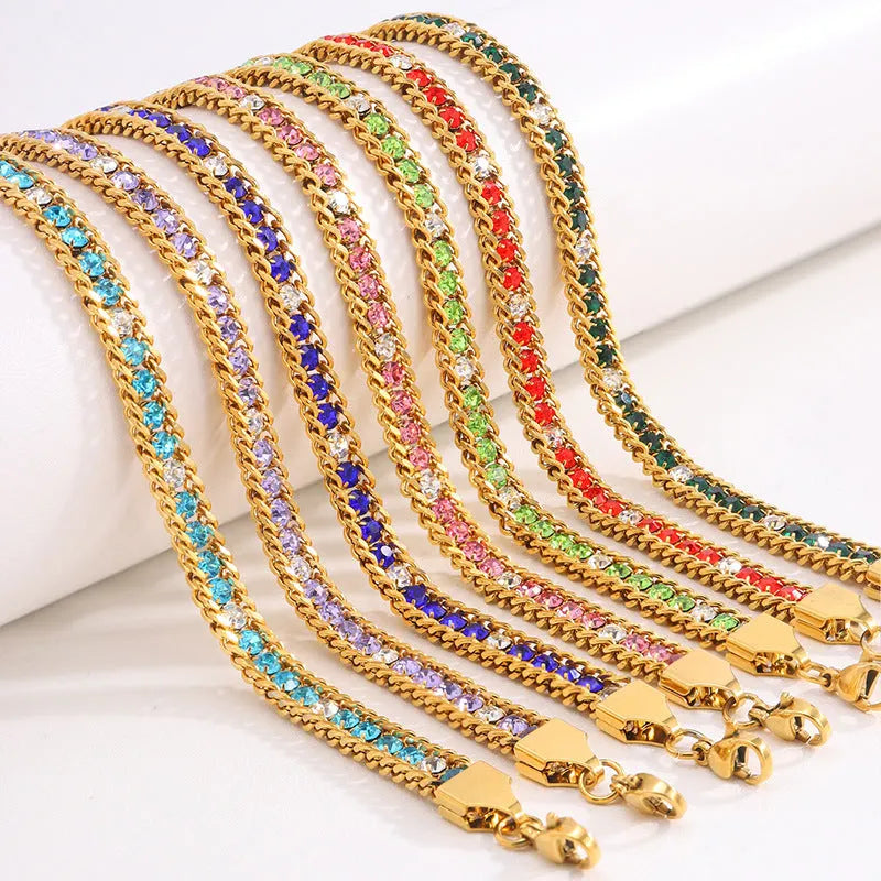Three-layer gold electroplated stainless steel chain bracelet on women's wrist with geometric links