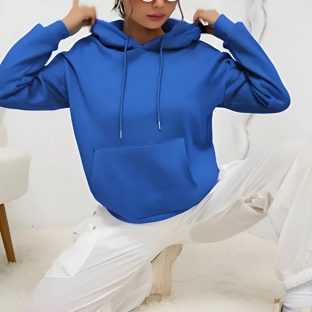 Women's loose grey drawstring pocket sweatshirt with long sleeves on a hanger