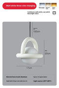 Matte black Nordic hanging pendant bedside lamp with a fabric cord.