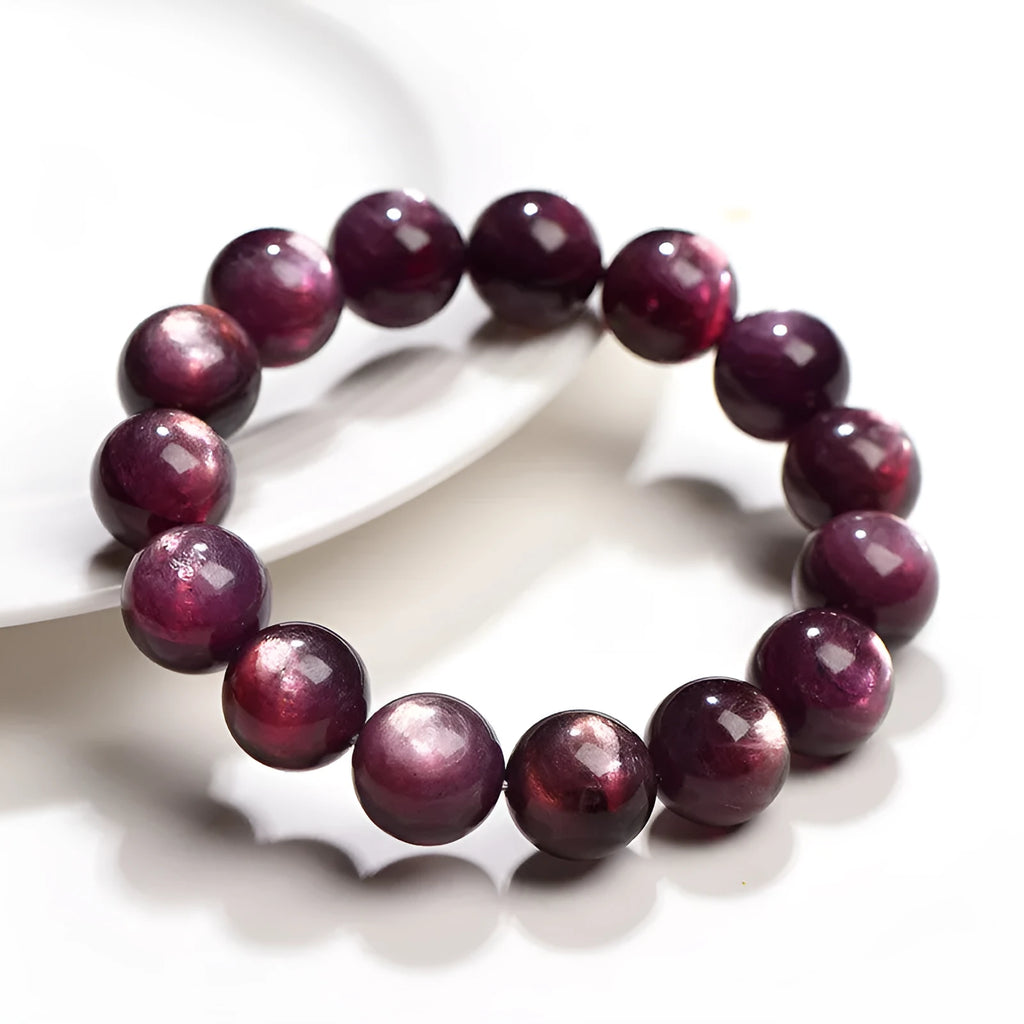 Natural purple lepidolite crystal round bead bracelet on a white background, showing available bead sizes.