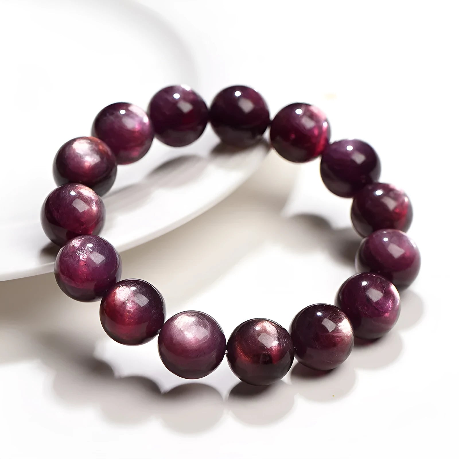 Natural purple lepidolite crystal round bead bracelet on a white background, showing available bead sizes.