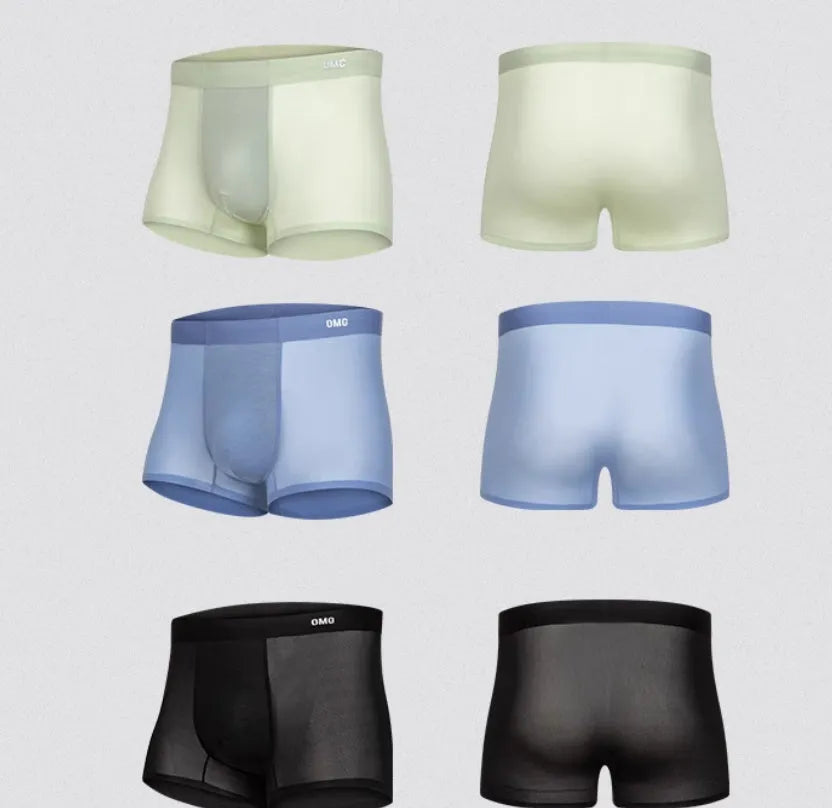 Men's seamless fitness shorts in black, shown flat, highlighting the lightweight fabric and lack of seams.