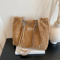 Large corduroy underarm tote bag for women with double straps, horizontal square shape, and splicing detail