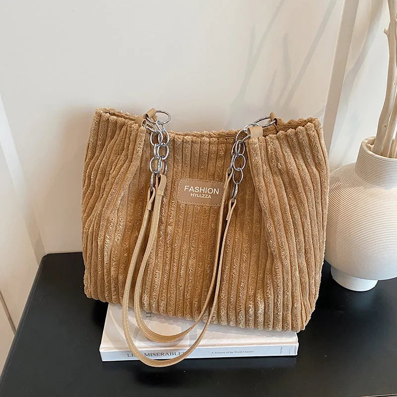 Large corduroy underarm tote bag for women with double straps, horizontal square shape, and splicing detail
