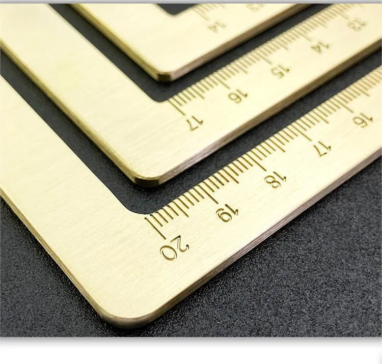 Solid brass calligraphy weight brush and paper scale with decorative carved designs