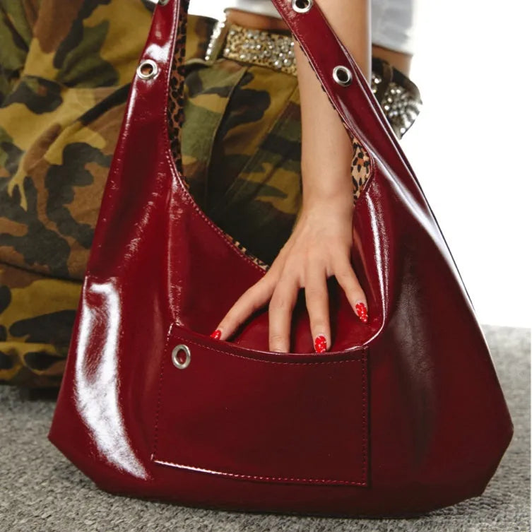 Red leopard print women's shoulder bag in a retro dumpling shape made from PU leather.