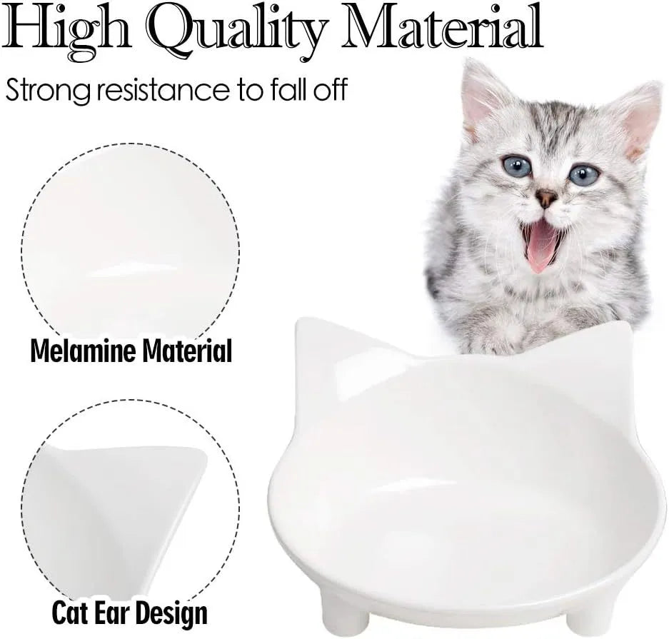 Shallow black melamine cat bowl with non-slip rubber base on a wooden floor.