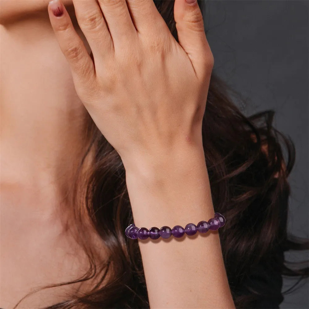 Men's natural stone beads elastic string bracelet 19cm length with birthday card on neutral background