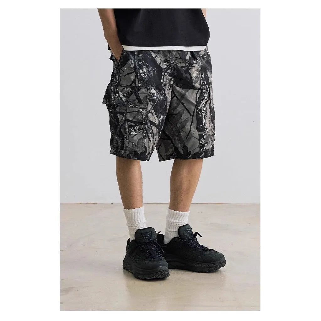 Loose casual straight-leg denim shorts in army green with zip placket closure