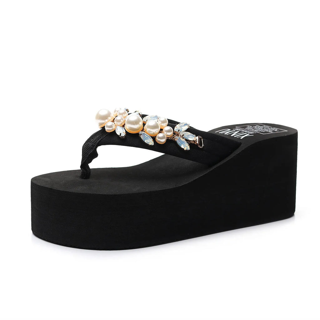 Women's high-heeled flip-flop in cotton cloth, shown in beige colour on a white background.