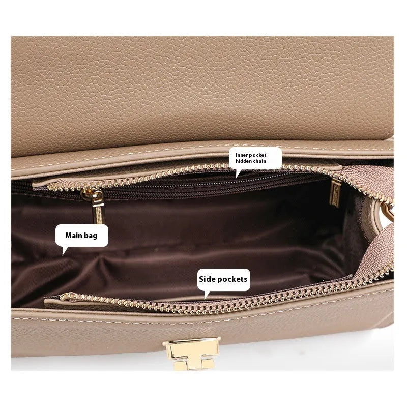 Elephant grey vintage handbag with litchi pattern texture and lock detail