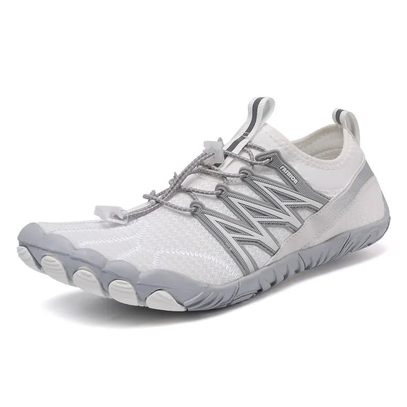 Indoor fitness training sneakers with non-slip rubber sole in various colours showing striped pattern and low top design