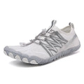 Indoor fitness training sneakers with non-slip rubber sole in various colours showing striped pattern and low top design