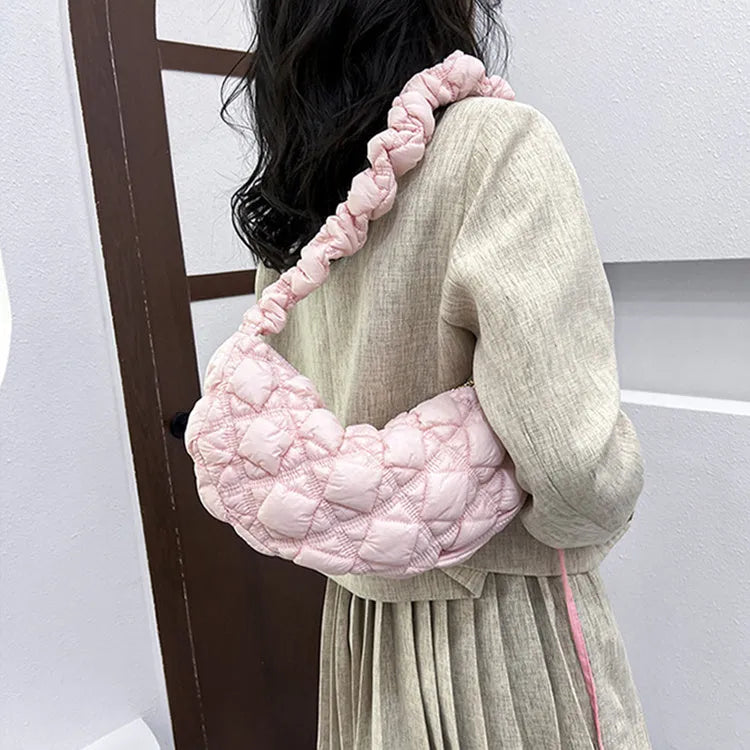Women's simple nylon cloud underarm messenger bag in a solid colour with an adjustable shoulder strap.