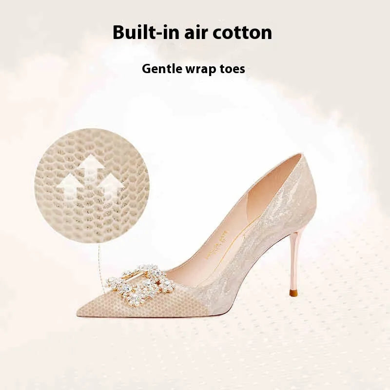 Champagne Gold pointed-toe high heel pumps with rhinestone and sequin decorations on a stiletto heel.