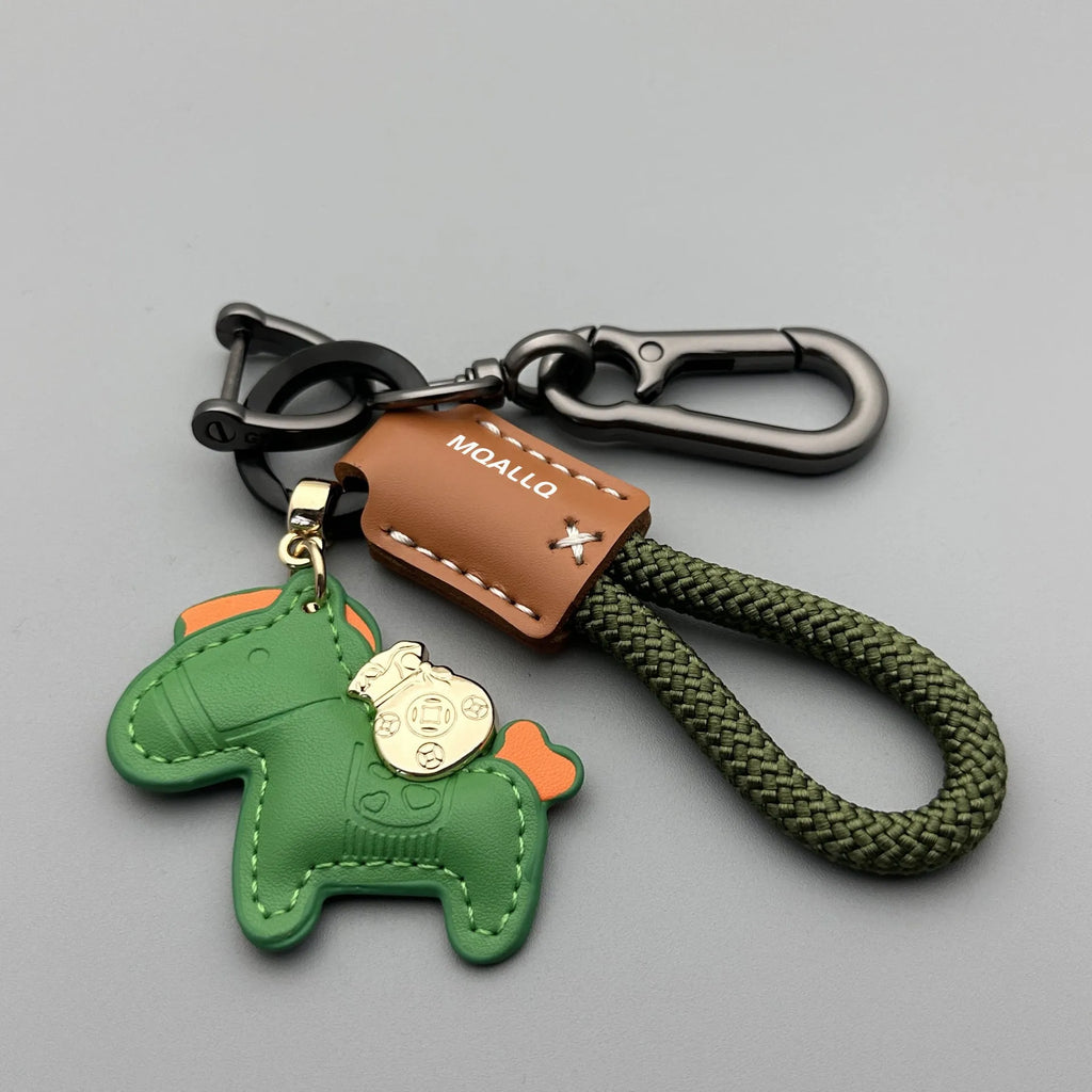 Handmade car keychain with a zinc alloy pony charm on a cowhide cord, shown in multiple colour options.