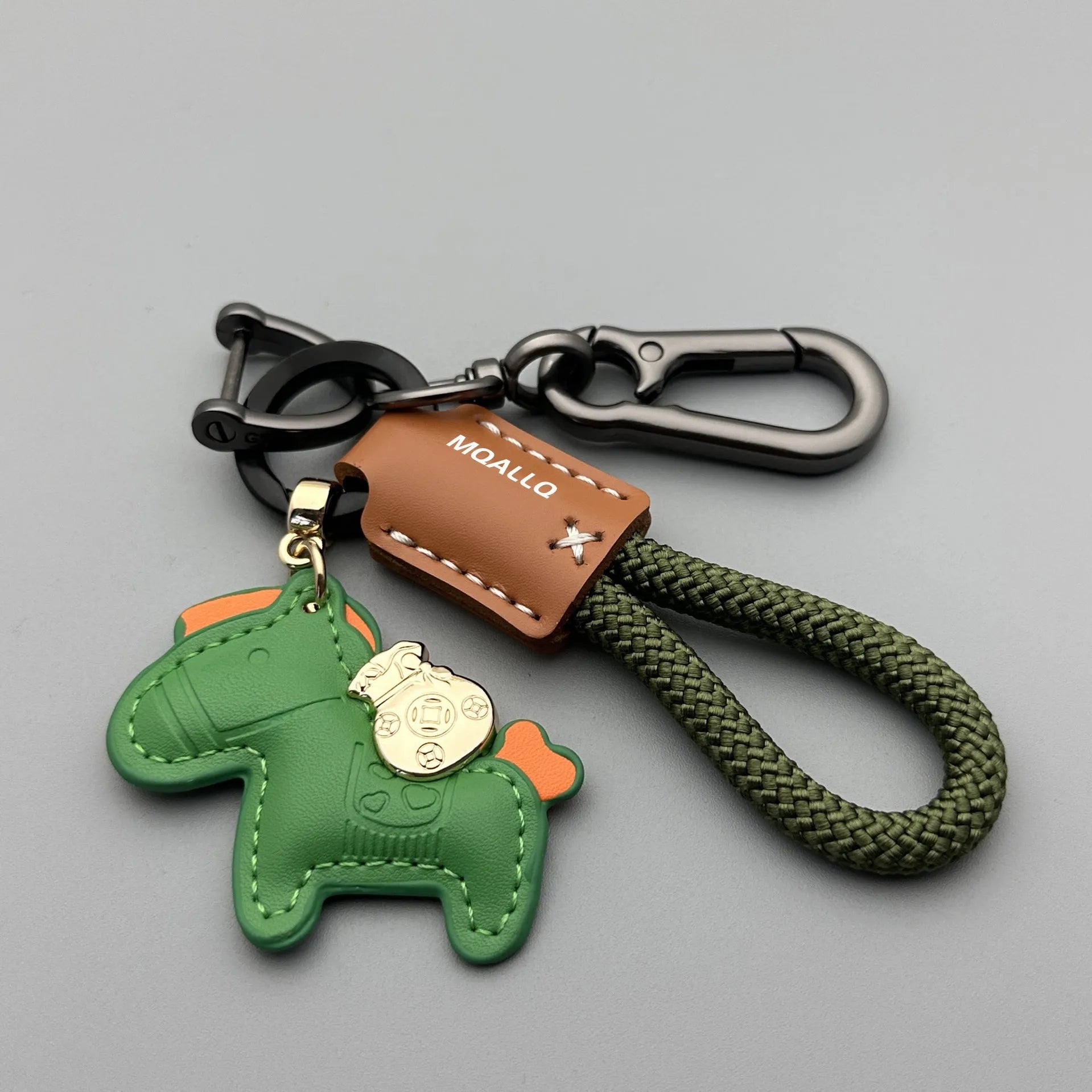 Handmade car keychain with a zinc alloy pony charm on a cowhide cord, shown in multiple colour options.