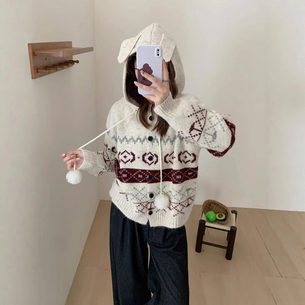 Plus size women's grey brocade sweater coat with geometric pattern and long sleeves.