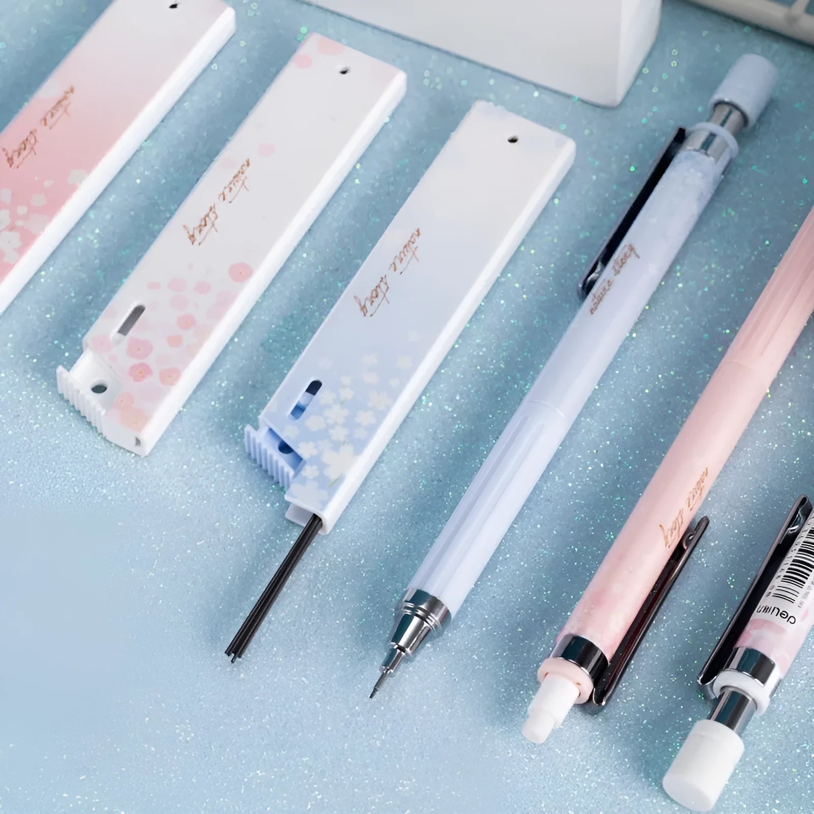 Cartoon automatic pencil set with three 0.5mm pens and HB refill boxes