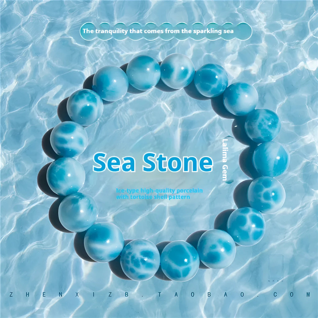 Blue Bodhi bracelet with pearl elements, showing Maillard style and range of bead sizes.
